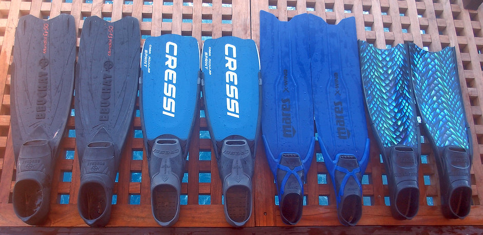 Four pairs of freediving fins for snorkelers